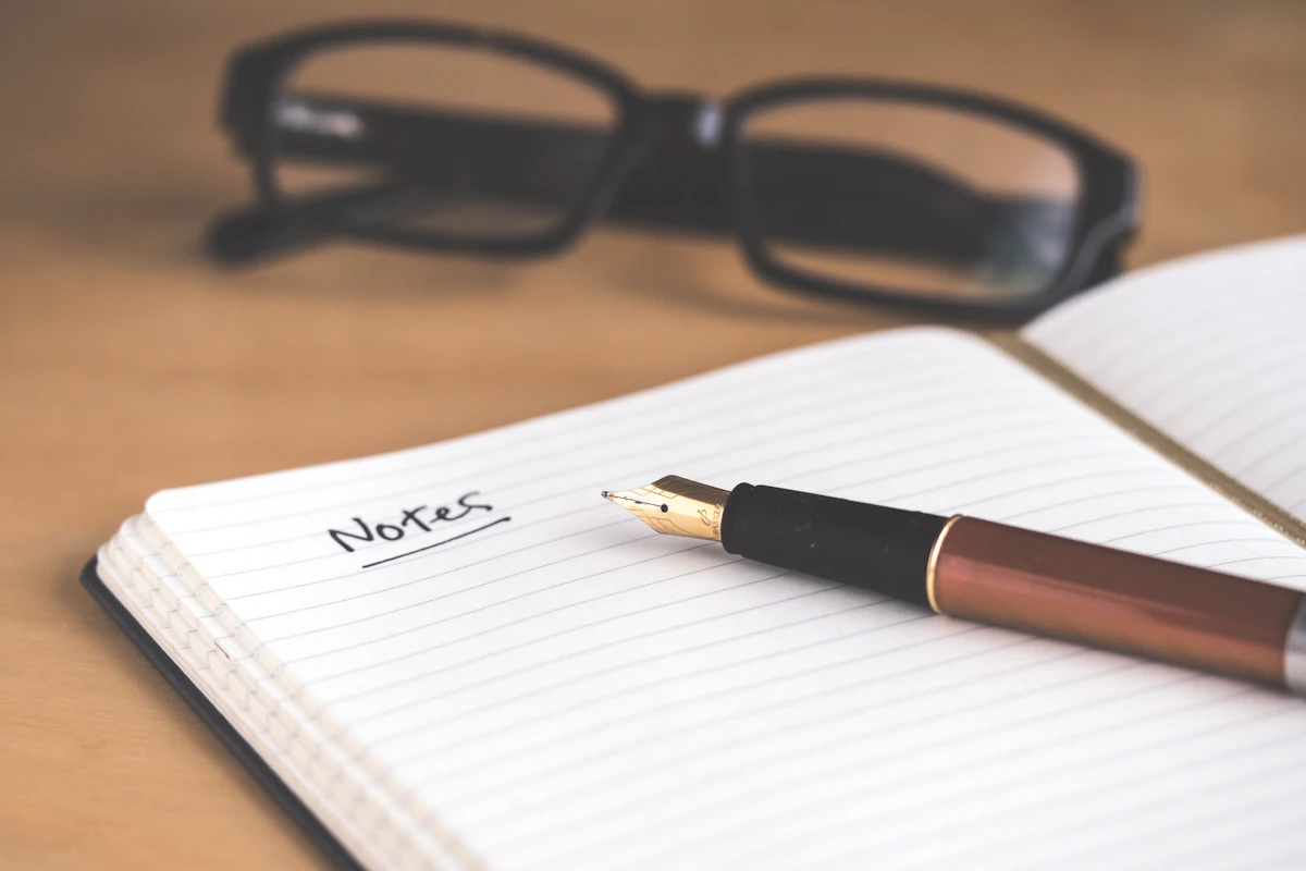 An open notebook and pen, for mapping out how an order really moves before reaching for software